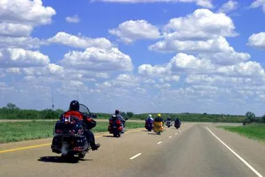 Motorcyclists riding on open highway